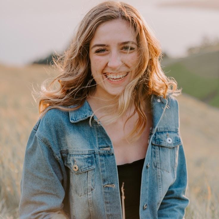 Kaveri Mehta, Lead Design Curator at Voyage Pilot Sketch, reviewing corporate floral arrangements
